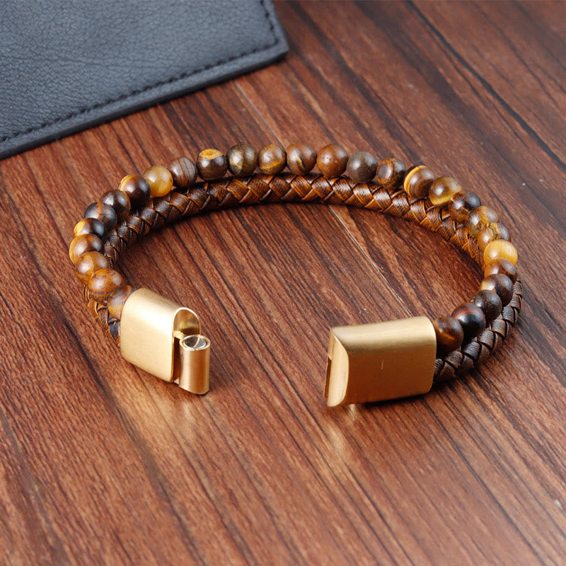 Bracciale con fibbia in acciaio al titanio e pelle con perline di pietra occhio di tigre intrecciate multistrato Buddha Stones