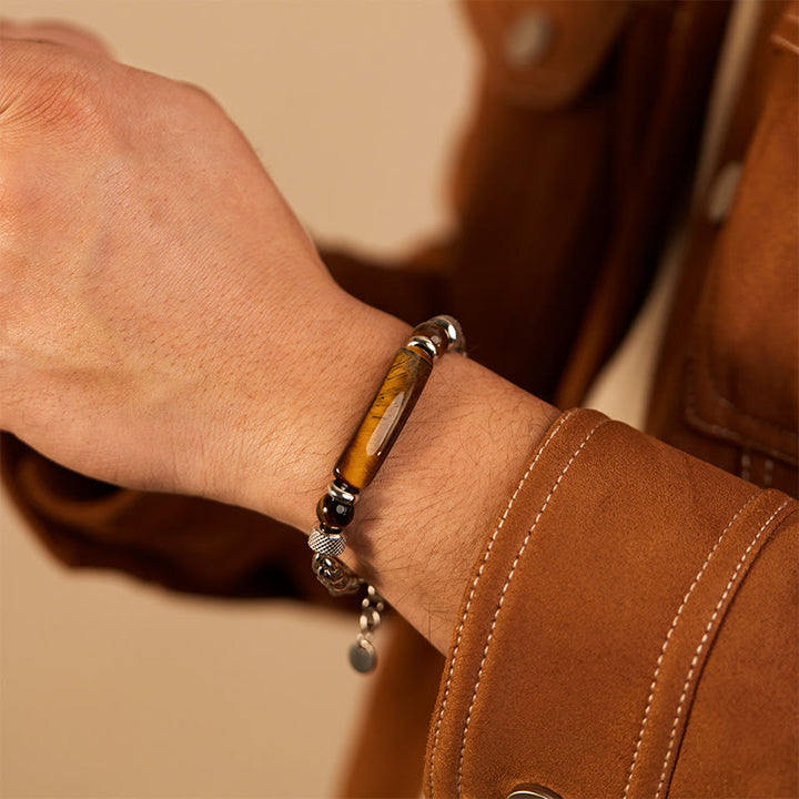 Bracciale con fibbia in acciaio al titanio e pietra di ossidiana nera con occhio di tigre Buddha Stones