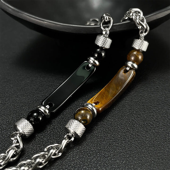 Bracciale con fibbia in acciaio al titanio e pietra di ossidiana nera con occhio di tigre Buddha Stones