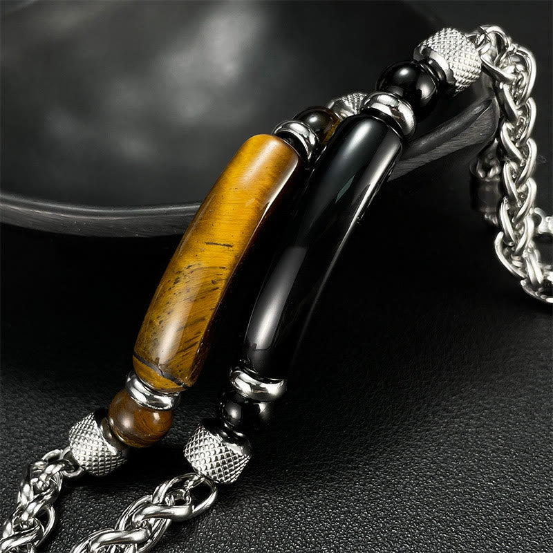 Bracciale con fibbia in acciaio al titanio e pietra di ossidiana nera con occhio di tigre Buddha Stones