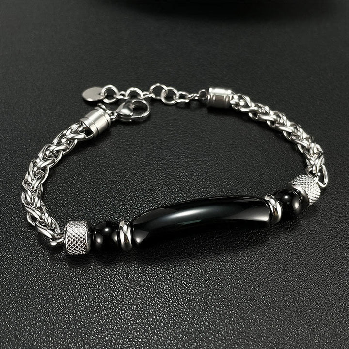 Bracciale con fibbia in acciaio al titanio e pietra di ossidiana nera con occhio di tigre Buddha Stones