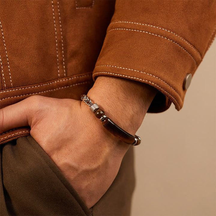 Bracciale con fibbia in acciaio al titanio e pietra di ossidiana nera con occhio di tigre Buddha Stones