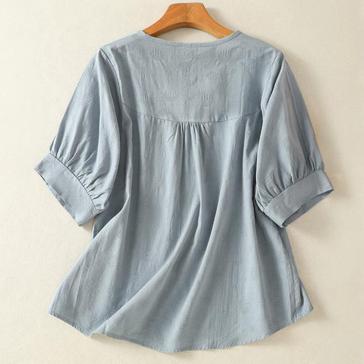 Maglietta da donna in cotone a maniche corte con scollo rotondo e motivo Buddha Stones - image 1