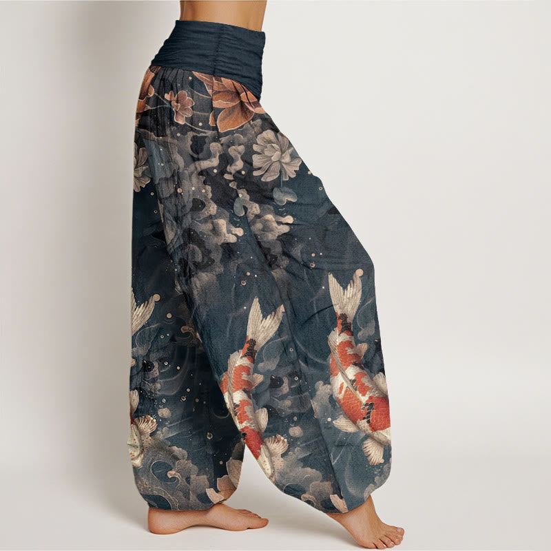 Pantaloni harem da donna con elastico in vita, in puro cotone, con motivo a Buddha Stones koi colorati e fiori di loto.