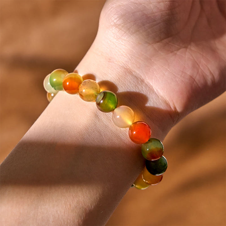Bracciale Buddha Stones in agata pavone naturale colorata, per la purificazione del coraggio