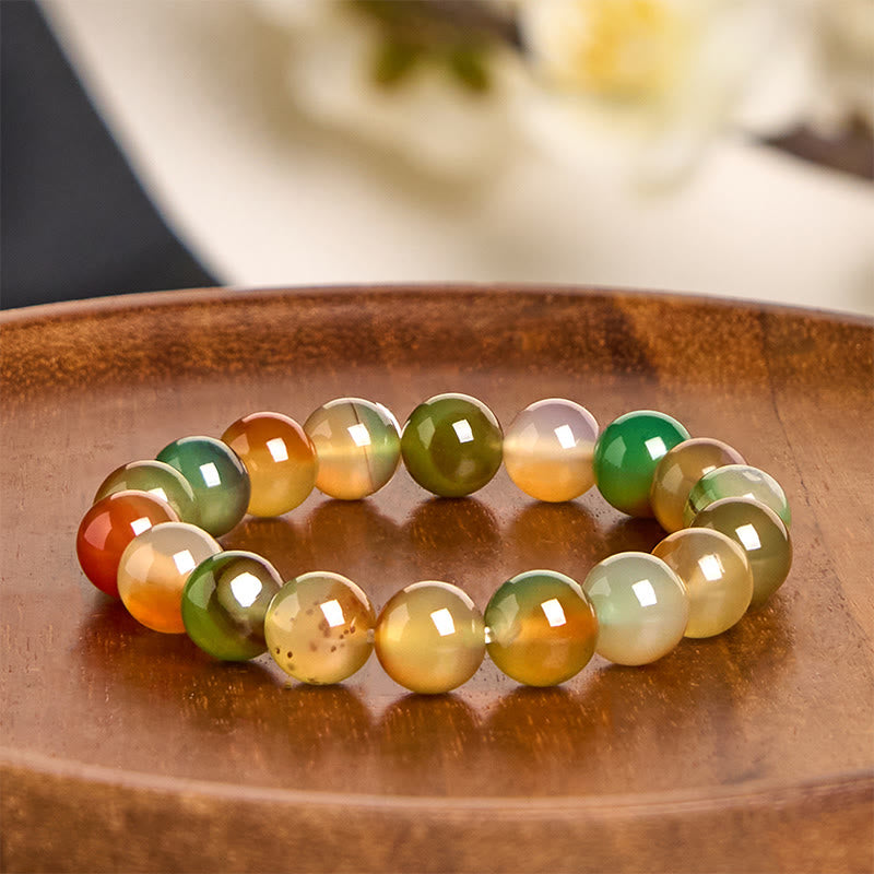Bracciale Buddha Stones in agata pavone naturale colorata, per la purificazione del coraggio