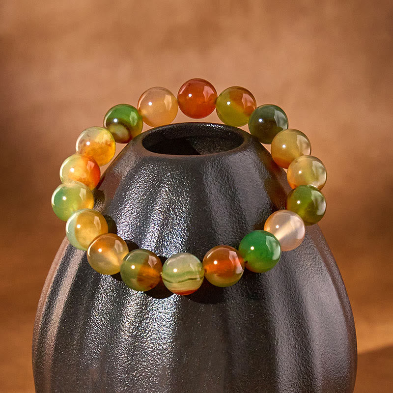 Bracciale Buddha Stones in agata pavone naturale colorata, per la purificazione del coraggio