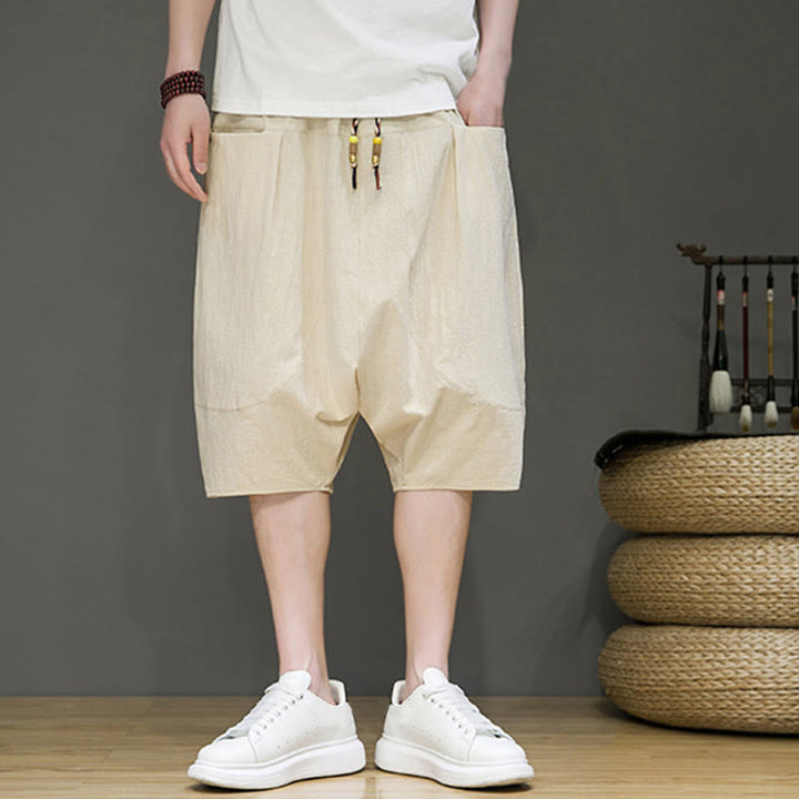 Pantaloni capri harem da uomo in cotone e lino con coulisse e tasche, con stampa Buddha Stones. - image 2