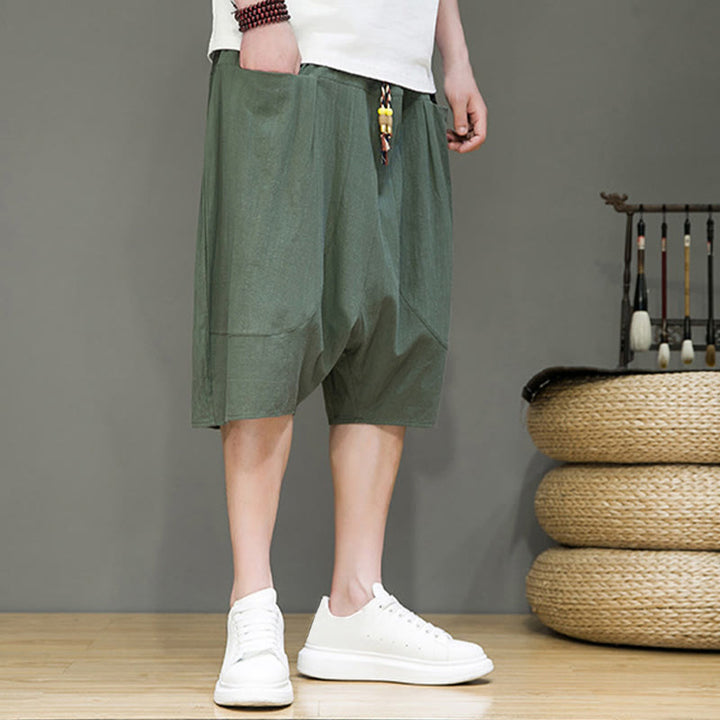 Pantaloni capri harem da uomo in cotone e lino con coulisse e tasche, con stampa Buddha Stones. - image 22