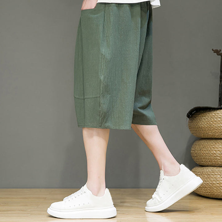 Pantaloni capri harem da uomo in cotone e lino con coulisse e tasche, con stampa Buddha Stones. - image 25
