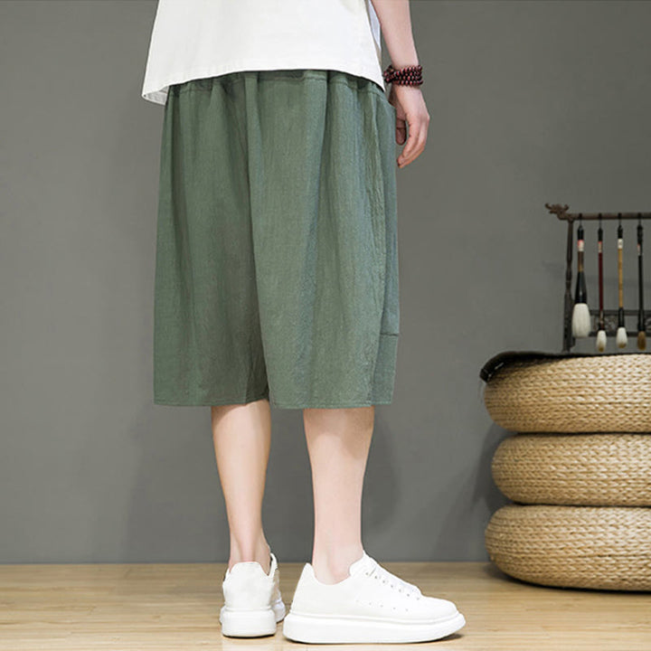 Pantaloni capri harem da uomo in cotone e lino con coulisse e tasche, con stampa Buddha Stones. - image 24
