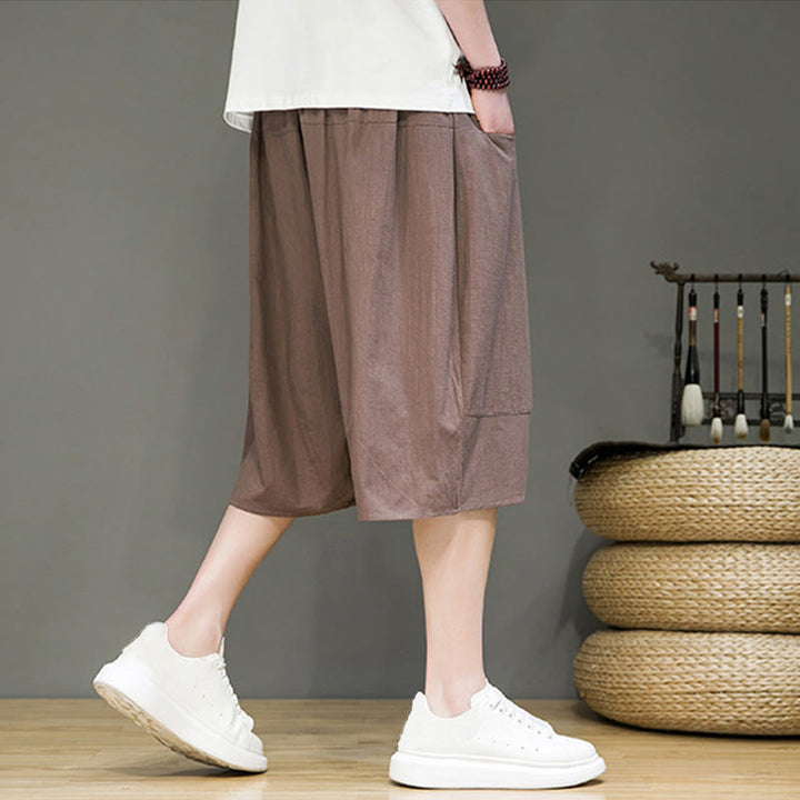 Pantaloni capri harem da uomo in cotone e lino con coulisse e tasche, con stampa Buddha Stones. - image 32