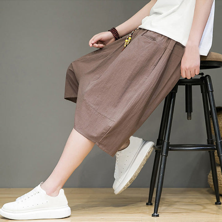 Pantaloni capri harem da uomo in cotone e lino con coulisse e tasche, con stampa Buddha Stones. - image 35