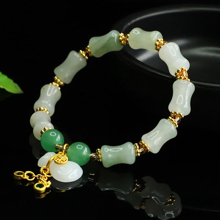 Bracciale della prosperità con motivo a sacchetto di denaro con carattere Fu in giada naturale Tianshan Buddha Stones
