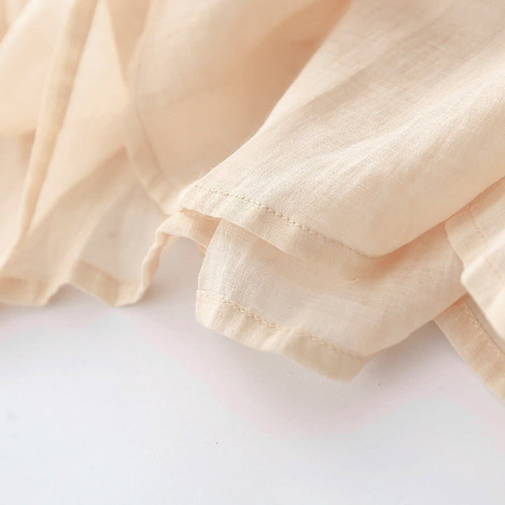 Abito midi in cotone e lino a maniche lunghe con tasche, ricamo di Buddha Stones e bottoni - image 13