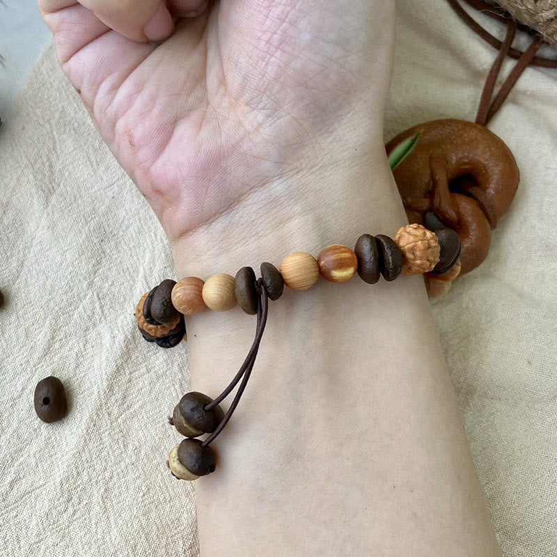 Bracciale di protezione in legno di sandalo con chicchi di caffè e nuvola irregolare naturale Buddha Stones - image 5