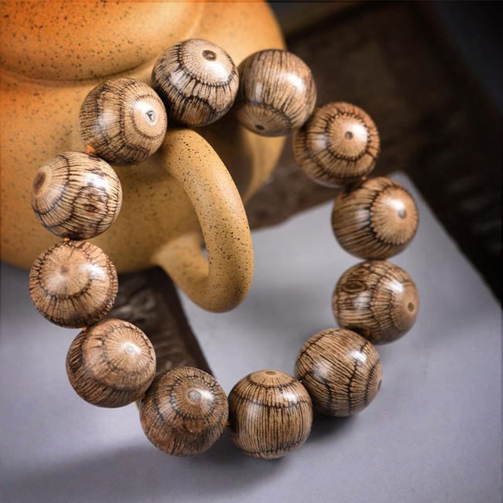 Braccialetto di protezione con perline di legno di gnetum Buddha Stones - image 9