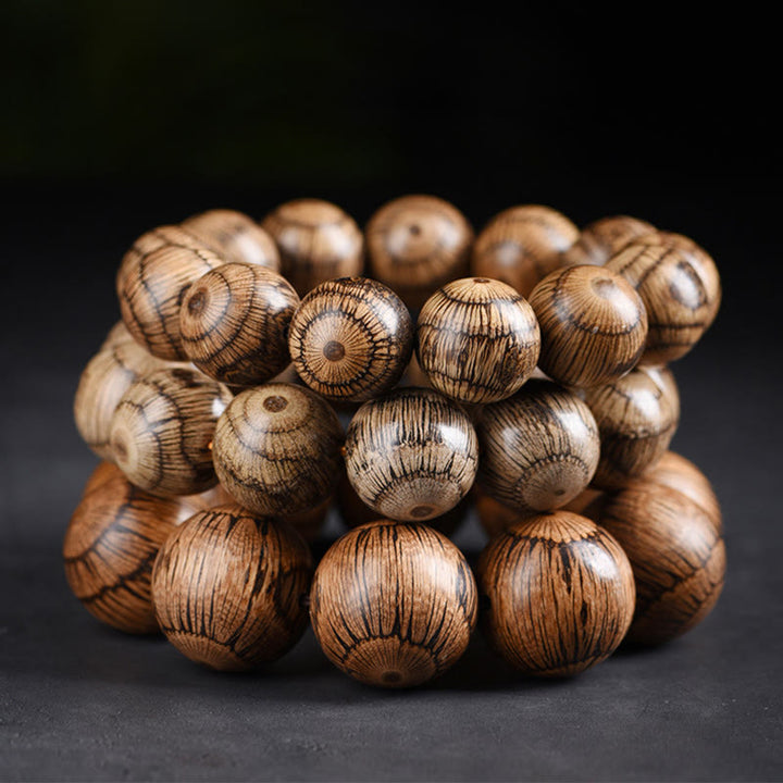 Braccialetto di protezione con perline di legno di gnetum Buddha Stones - image 12