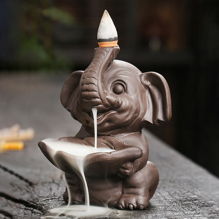 Buddha Stones, piccolo elefante che tiene una foglia, argilla viola, fontana di fumo a riflusso, bruciatore di incenso curativo, decorazione - image 4