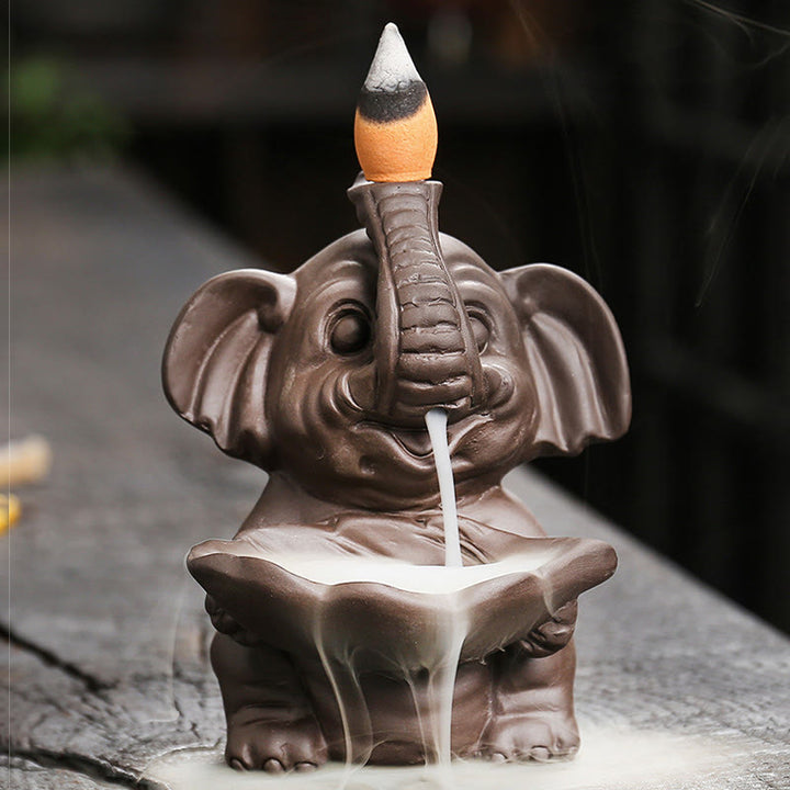 Buddha Stones, piccolo elefante che tiene una foglia, argilla viola, fontana di fumo a riflusso, bruciatore di incenso curativo, decorazione - image 9
