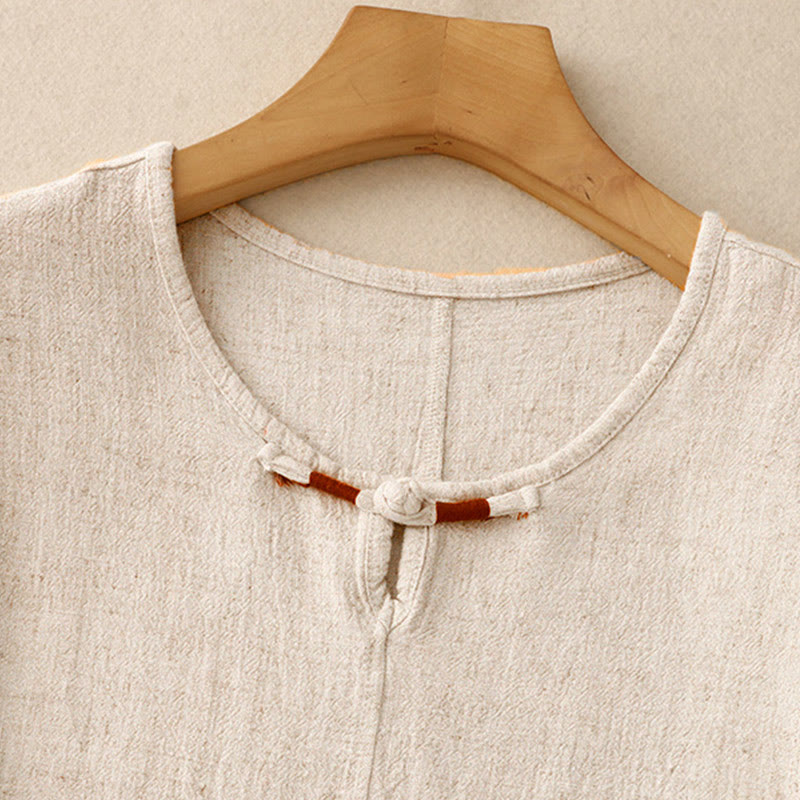 Camicia da donna in lino e cotone con maniche a mezza manica, con tasche, spacchi laterali e bottoni a rana, color block Buddha Stones - image 1