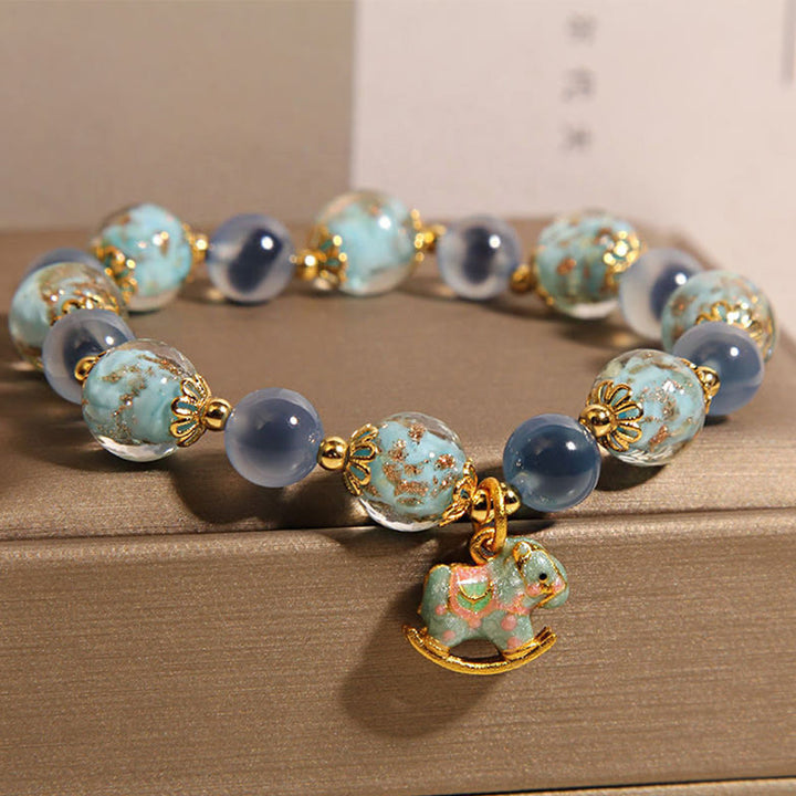 Bracciale Buddha Stones in agata naturale caramellata, cristallo bianco, forza del cavallo - image 3
