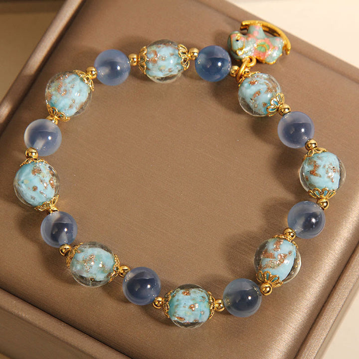 Bracciale Buddha Stones in agata naturale caramellata, cristallo bianco, forza del cavallo - image 5