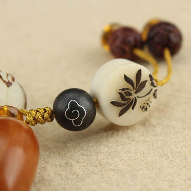 Buddha Stones Bracciale tibetano Mala con semi di Bodhi bianchi e pace - image 12