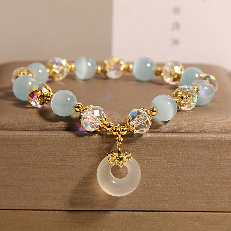 Braccialetto dell'equilibrio con fibbia della pace in cristallo bianco e Buddha Stones blu occhio di gatto - Occhio di gatto blu (circonferenza del polso: 15-19 cm) - image 1