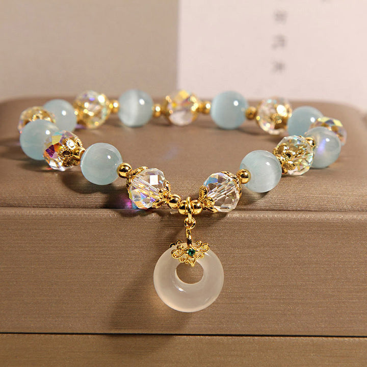 Braccialetto dell'equilibrio con fibbia della pace in cristallo bianco e Buddha Stones blu occhio di gatto - Occhio di gatto blu (circonferenza del polso: 15-19 cm) - image 1
