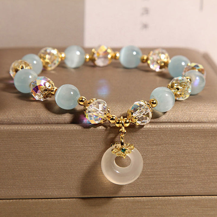 Braccialetto dell'equilibrio con fibbia della pace in cristallo bianco e Buddha Stones blu occhio di gatto - image 3