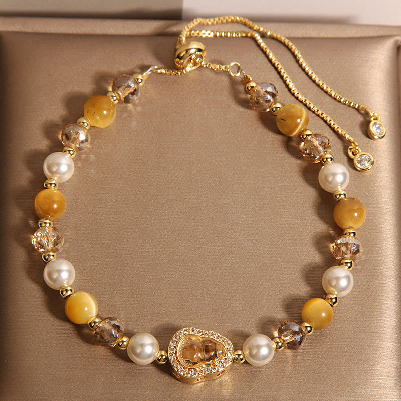 Braccialetto della prosperità con perle di zucca e occhio di gatto giallo Buddha Stones - Occhio di gatto giallo e perla (circonferenza polso: 14-18 cm) - image 1
