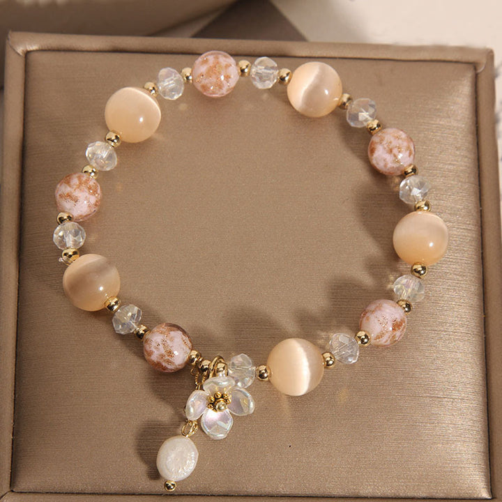 Bracciale Buddha Stones con pietra occhio di gatto gialla e acquamarina, fiore e pace - image 8
