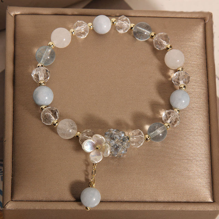 Bracciale Buddha Stones con pietra occhio di gatto gialla e acquamarina, fiore e pace - image 3