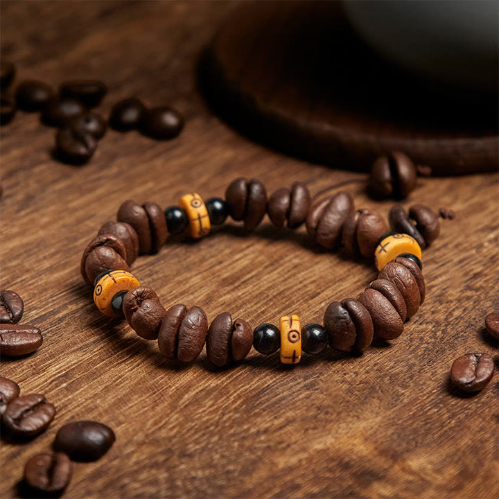 Bracciale con perline di osso di yak e chicchi di caffè naturali Buddha Stones
