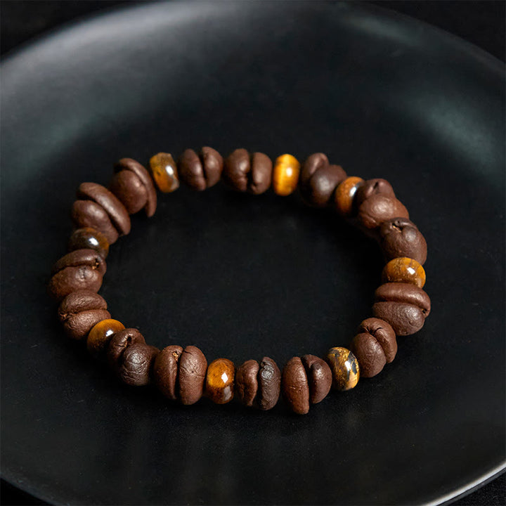 Bracciale con perle di pietra lavica, occhio di tigre, chicchi di caffè naturali e diaspro grigio Buddha Stones - image 4