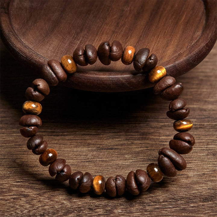 Bracciale con perle di pietra lavica, occhio di tigre, chicchi di caffè naturali e diaspro grigio Buddha Stones - image 2