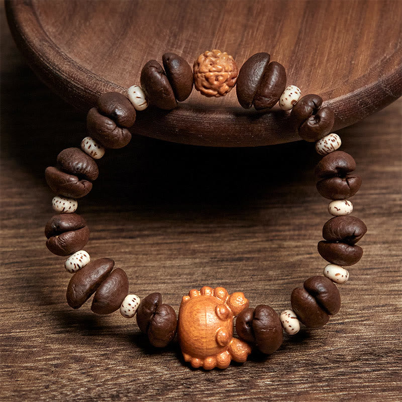 Bracciale in legno di wengé , Buddha Stones, granchio fatto a mano, monete di rame e chicchi di caffè. - image 2