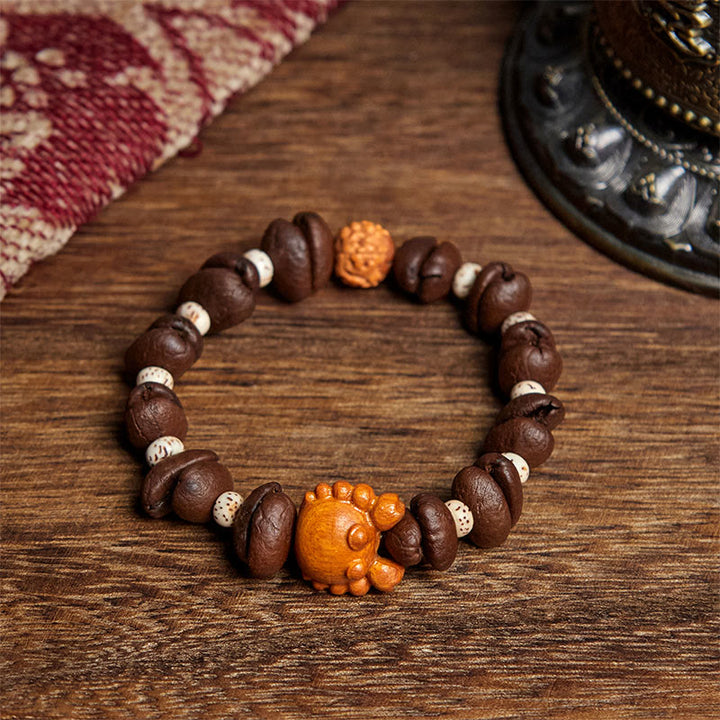 Bracciale in legno di wengé , Buddha Stones, granchio fatto a mano, monete di rame e chicchi di caffè. - Chicco di caffè (circonferenza del polso: 17,5 cm) - image 1
