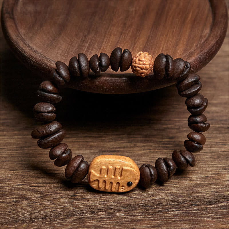 Bracciale in legno di wengé con veri chicchi di caffè e lische di pesce fatte a mano da Buddha Stones - image 2
