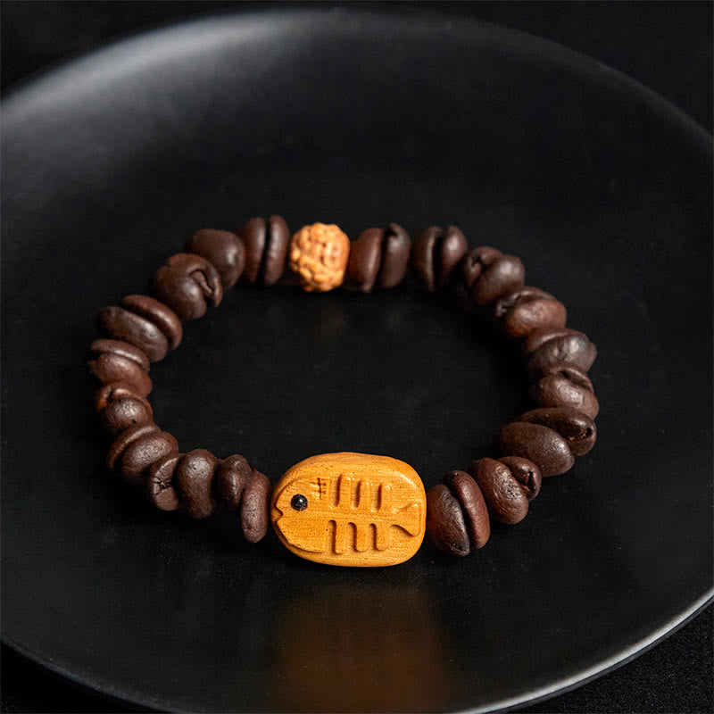Bracciale in legno di wengé con veri chicchi di caffè e lische di pesce fatte a mano da Buddha Stones - image 4