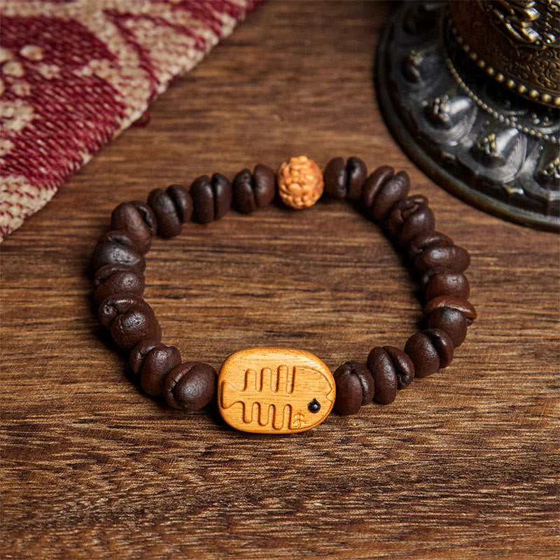 Bracciale in legno di wengé con veri chicchi di caffè e lische di pesce fatte a mano da Buddha Stones - Chicco di caffè (circonferenza del polso: 17,5 cm) - image 1