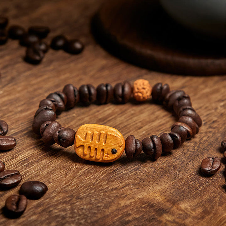 Bracciale in legno di wengé con veri chicchi di caffè e lische di pesce fatte a mano da Buddha Stones - image 3
