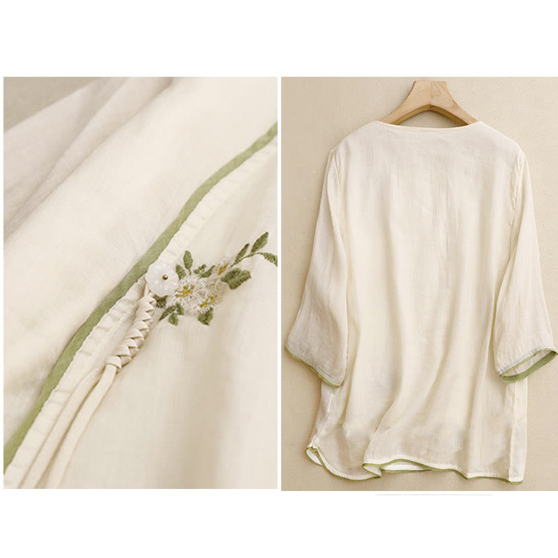 Camicia da donna a maniche a tre quarti con scollo rotondo e ricamo floreale a foglie verdi, colore beige Buddha Stones. - image 1