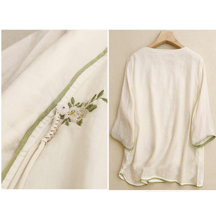 Camicia da donna a maniche a tre quarti con scollo rotondo e ricamo floreale a foglie verdi, colore beige Buddha Stones. - image 1