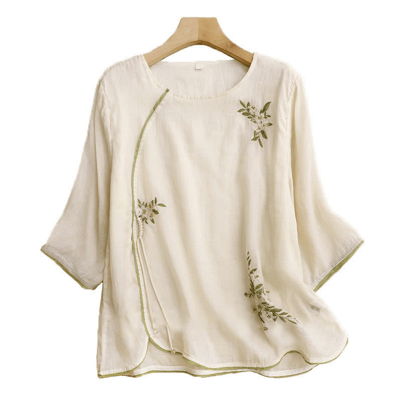 Camicia da donna a maniche a tre quarti con scollo rotondo e ricamo floreale a foglie verdi, colore beige Buddha Stones. - image 12