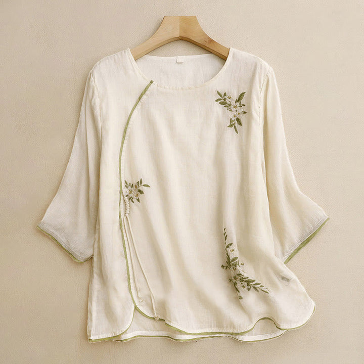 Camicia da donna a maniche a tre quarti con scollo rotondo e ricamo floreale a foglie verdi, colore beige Buddha Stones. - Beige - US12, UK/AU16, EU44 (2XL) - image 0