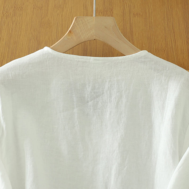 Camicia da donna a maniche corte con scollo a V e bottoni a tinta unita con motivo Buddha Stones. - image 9