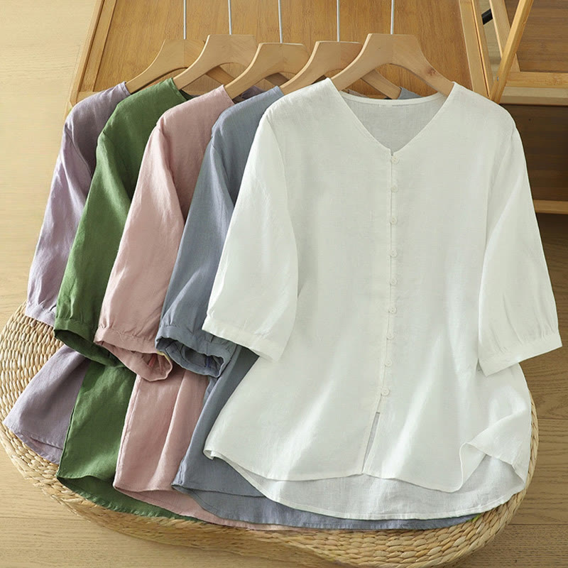 Camicia da donna a maniche corte con scollo a V e bottoni a tinta unita con motivo Buddha Stones. - image 1