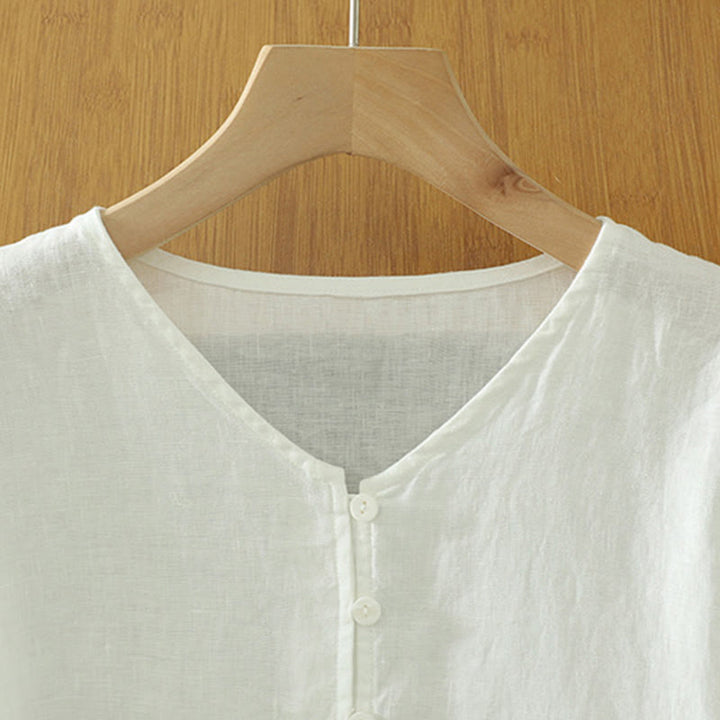 Camicia da donna a maniche corte con scollo a V e bottoni a tinta unita con motivo Buddha Stones. - image 8